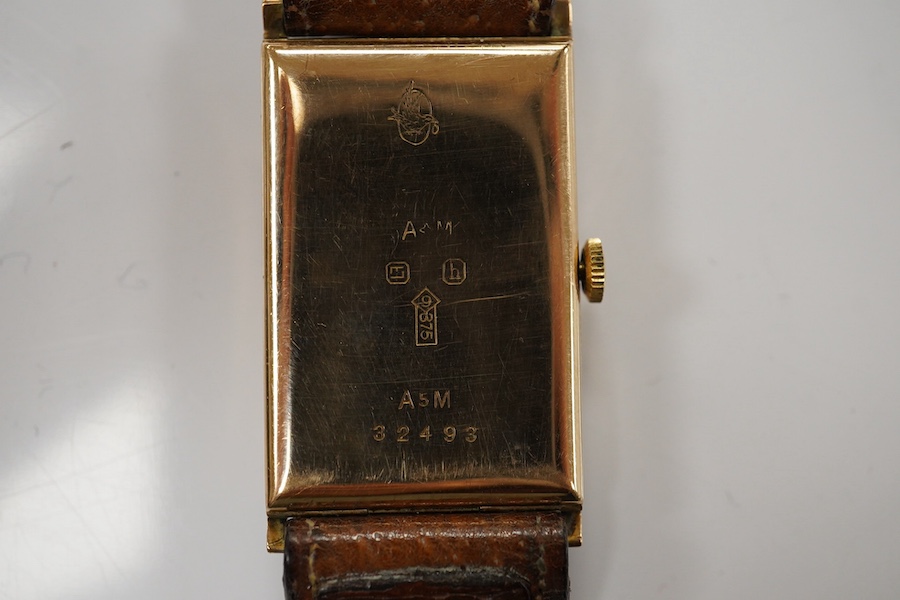 A gentleman's 1930's 9ct gold rectangular dial manual wind wrist watch, with Arabic dial and subsidiary seconds, case diameter 22mm, together with a George V silver J.W. Benson open faced pocket watch. Condition - poor t